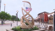 A permanent memorial is intalled outside the Allen Premium Outlets remembering the victims of the May 6, 2023 mass shooting.