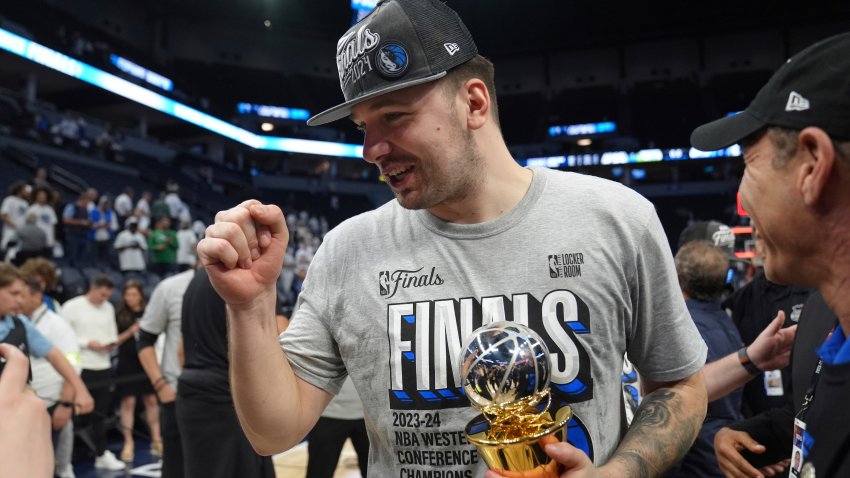 Dallas Mavericks guard Luka Doncic celebrates the team’s win over the Minnesota Timberwolves in Game 5 of the Western Conference finals in the NBA basketball playoffs Thursday, May 30, 2024, in Minneapolis. The Mavericks won 124-103, taking the series 4-1 and moving on to the NBA Finals.