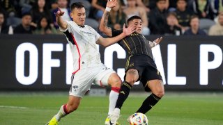 FC Dallas defender Sam Junqua, left, and Los Angeles FC forward Cristian Olivera battle for the ball during the first half of a Major League Soccer match Saturday, June 1, 2024, in Los Angeles. (AP Photo/Mark J. Terrill)