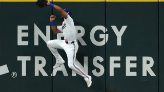 Texas Rangers center fielder Leody Taveras catches a fly ball by New York Mets’ J.D. Martinez in the second inning of a baseball game Monday, June 17, 2024, in Arlington, Texas.
