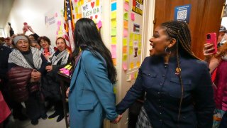 Rep. Cori Bush, D-Mo., from right, and Rep. Rashida Tlaib, D-Mich., come out of Tlaib's office to meet with activists