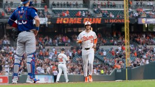 burnes shackles rangers over 7 innings and orioles hit 4 hrs in defeat of the champs