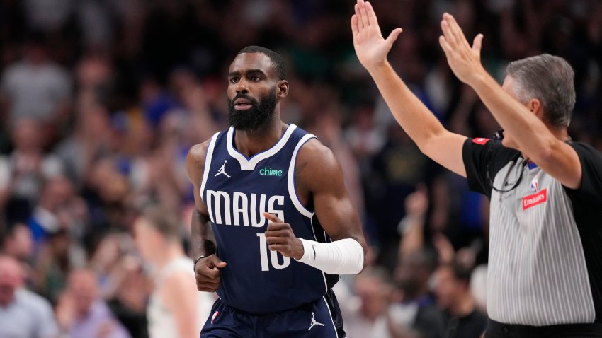 Dallas Mavericks forward Tim Hardaway Jr. (10) runs up court after scoring against the Boston Celtics during the second half in Game 4 of the NBA basketball finals, Friday, June 14, 2024, in Dallas. (AP Photo/Julio Cortez)