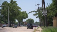 Oncor says leaning power poles may look threatening but are safe.