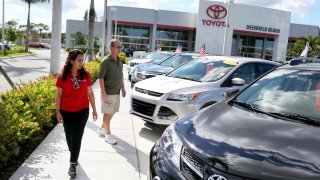 Shoppers at the Toyota of Deerfield car dealership in Deerfield Beach, Fla.