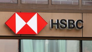 HSBC reports narrow first-half profit decline, beats expectations