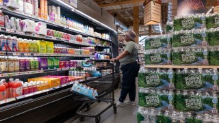 People shop at a grocery store in Brooklyn on July 11, 2024 in New York City. 