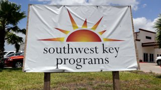 FILE – A Southwest Key Programs sign is displayed on June 20, 2014, in Brownsville, Texas. Southwest Key, the largest housing provider for unaccompanied migrant children has been accused of “severe, pervasive, and unwelcome sexual abuse of and harassment” of children in its care, the Justice Department said Thursday, July 18, 2024.