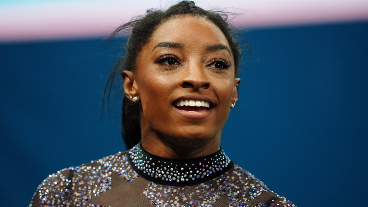 Simone Biles suffers calf injury at Olympics, returns to competition