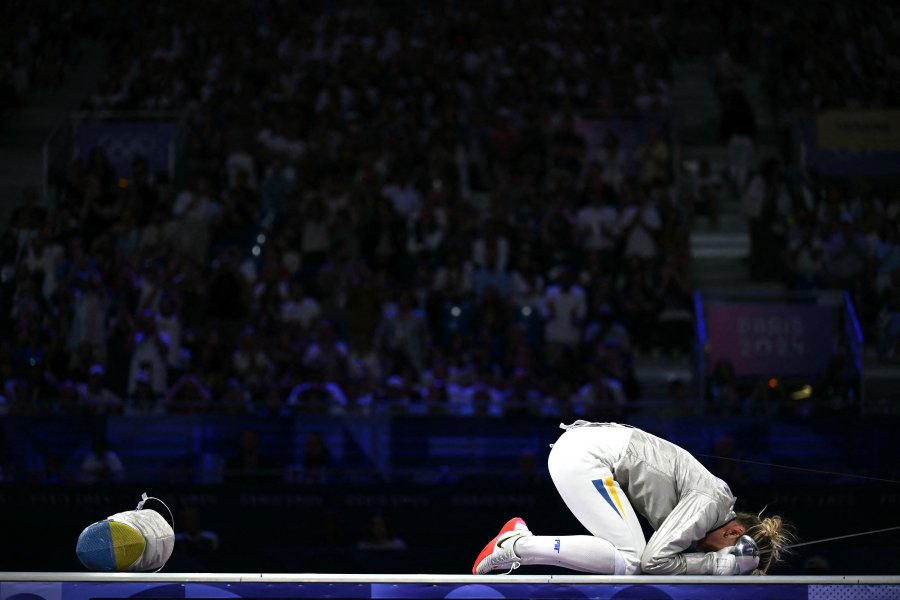 Ukraine's Olga Kharlan celebrates after winning