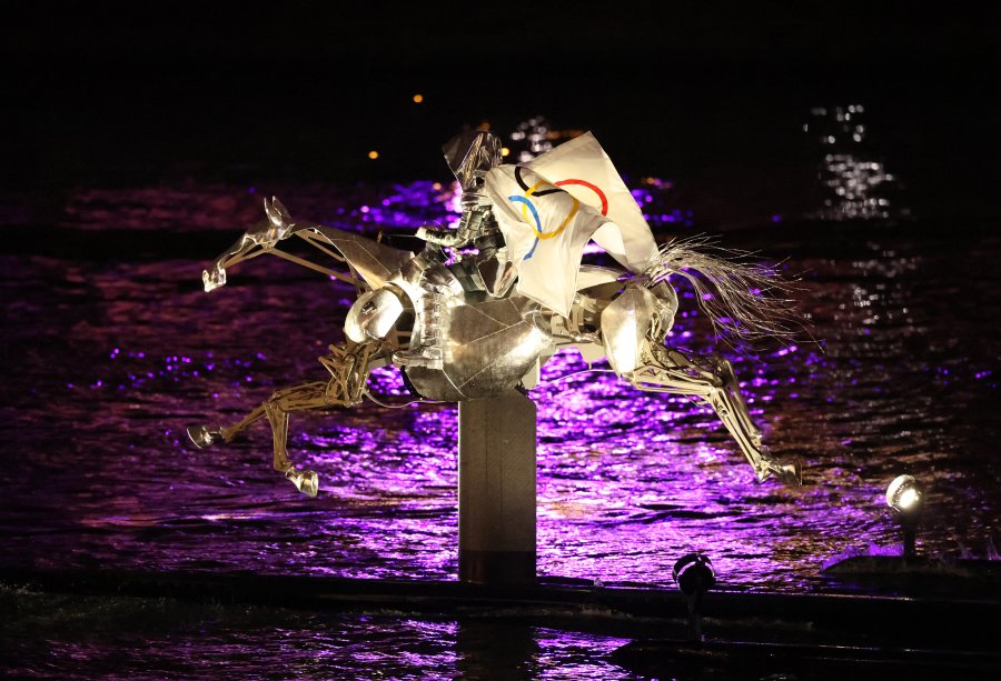 The Horsewoman, wearing the Flag of the International Olympic Committee