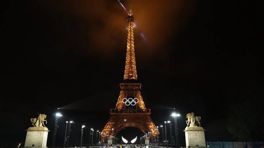 A Light Show takes place as The Olympic Rings on the Eiffel Tower are illuminated during the opening ceremony of the Olympic Games Paris 2024 at Place du Trocadero on July 26, 2024 in Paris, France.