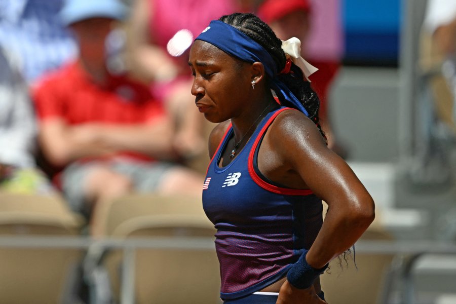 US' Coco Gauff reacts after a call goes against her