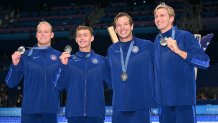 Silver medallists US' Luke Hobson, US' Carson Foster, US' Drew Kibler and US' Kieran Smith pose following the men's 4x200m freestyle relay swimming event during the Paris 2024 Olympic Games at the Paris La Defense Arena in Nanterre, west of Paris, on July 30, 2024. (Photo by Jonathan NACKSTRAND / AFP) (Photo by JONATHAN NACKSTRAND/AFP via Getty Images)