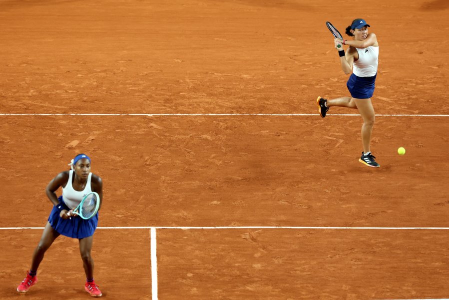 Coco Gauff and Jessica Pegula of Team USA play Ellen Perez and Daria Saville of Team Australia in the women's doubles first round match