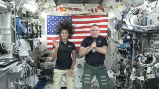 In this image from video provided by NASA, astronauts Suni Williams, left, and Butch Wilmore give a news conference aboard the International Space Station on Wednesday, July 10, 2024.