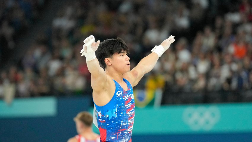 Jul 27, 2024; Paris, France; USA gymnast Asher Hong performs on the high bar during the Paris 2024 Olympic Summer Games at Bercy Arena. Mandatory Credit: Kyle Terada-USA TODAY Sports