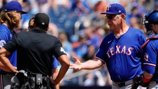 Jul 28, 2024; Toronto, Ontario, CAN; Texas Rangers manager Bruce Bochy (right) takes Texas Rangers pitcher Jon Gray (22) out of the game before throwing a pitch in the first inning at Rogers Centre. Mandatory Credit: John E. Sokolowski-USA TODAY Sports