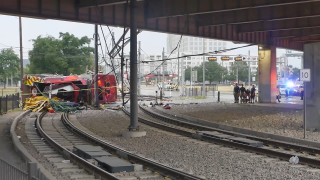 A DFR fire engine fell from the I-345 Expressway onto Good Latimer Expressway below.