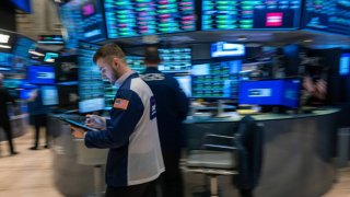 Traders work on the floor during morning trading at the New York Stock Exchange (NYSE) on March 6, 2024 in New York City.