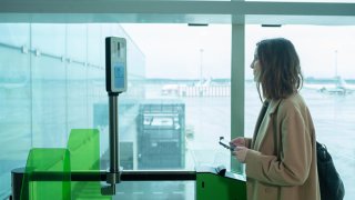 A woman tests Vueling’s new biometric recognition system at El Prat airport, January 19, 2023, in El Prat de Llobregat, Barcelona, Catalonia, Spain. 