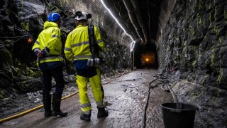 Workers inspect the Repository in ONKALO, a deep geological disposal underground facility, designed to safely store nuclear waste, on May 2, 2023, on the island of Eurajoki, western Finland.