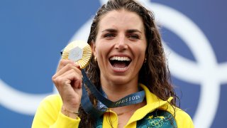 Australia's Jessica Fox poses with her gold medal for the women's canoe slalom single event at the 2024 Paris Olympics.