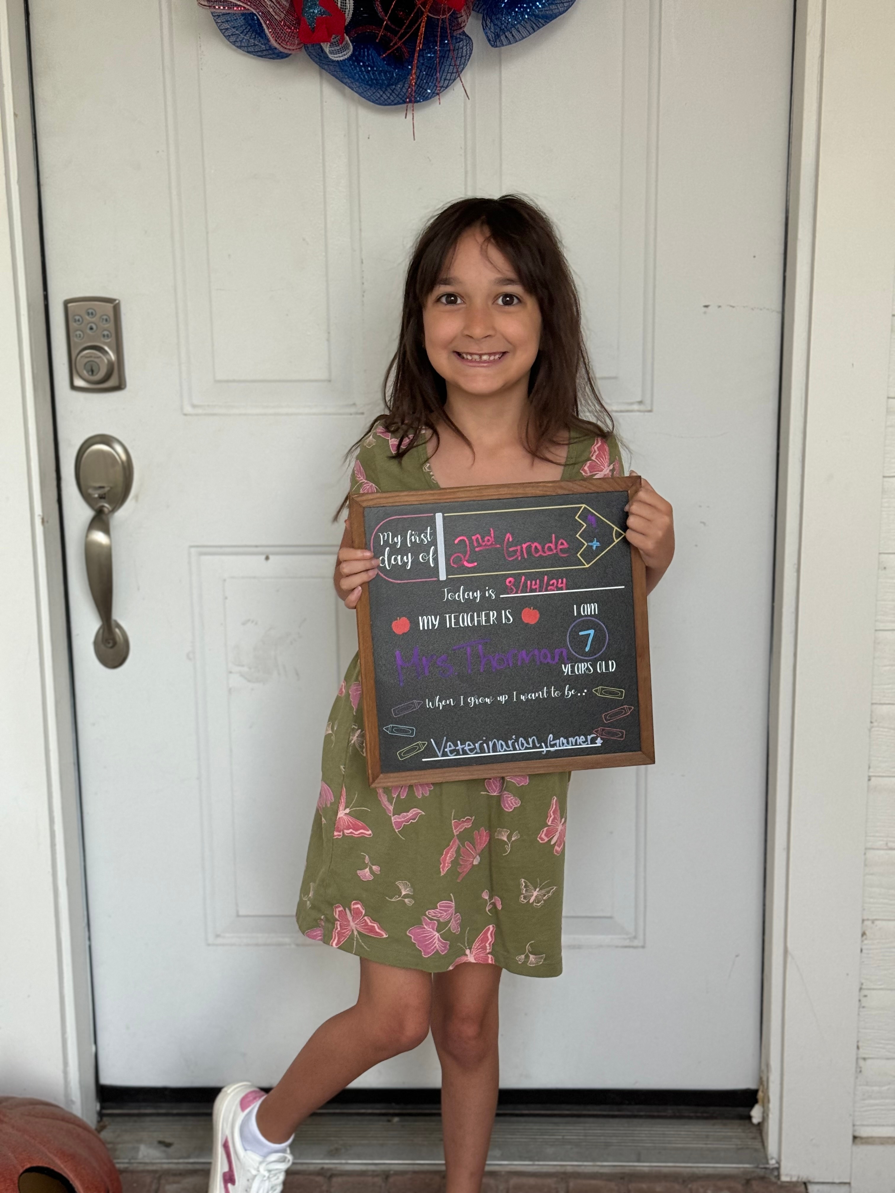 This is Emma. It is her first day of second grade at Midlothian ISD. She wants to be a veterinarian when she grows up. She enjoys gymnastics, dance and gaming on her iPad.