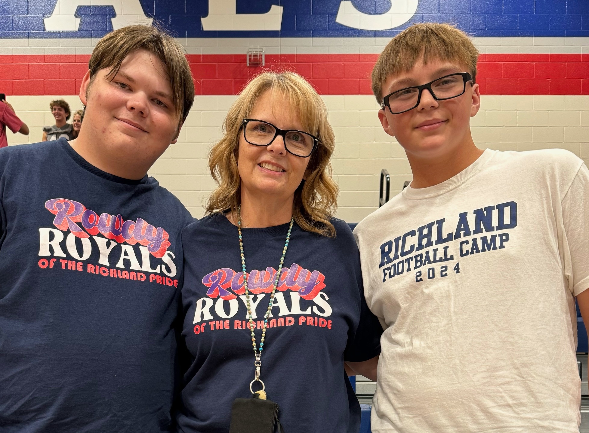 This is a first day photo of 3 generations of our family, all at Richland High School in North Richland Hills. I am a second generation graduate and teach English at Richland (also a third generation teacher in Birdville ISD). My son, Carson (left), is a third generation senior, and my great great-nephew, Bowen (right), is a fourth generation student starting his freshman year. 
We are so excited to continue our family tradition at Richland High School!!