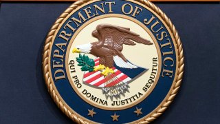 FILE – The Department of Justice seals is seen during a news conference at the DOJ office in Washington, May 16, 2023. Texas’ youth lockups remain beset by sexual abuse, excessive use of pepper spray and keeping children isolated in cells for most of the time, the DOJ said Thursday, Aug. 1, 2024, in a scathing report that accused the state of violating the constitutional rights of hundreds of youths inside the facilities.