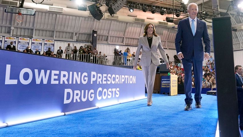 Democratic presidential nominee Vice President Kamala Harris, left, and President Joe Biden depart after speaking about the administration's efforts to lower prescription drug costs during an event at Prince George's Community College in Largo, Md., Thursday, Aug. 15, 2024.