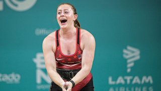 US’ Olivia Reeves celebrates after competing in the women’s 81kg weightlifting clean and jerk event of the Pan American Games Santiago 2023, at the Chimkowe Gymnasium in Santiago on October 23, 2023. (Photo by ERNESTO BENAVIDES / AFP) (Photo by ERNESTO BENAVIDES/AFP via Getty Images)