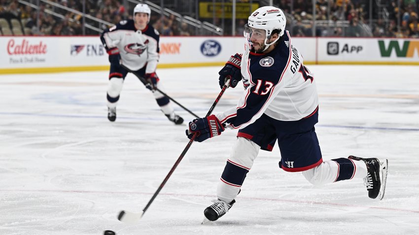 Johnny Gaudreau #13 of the Columbus Blue Jackets attempts a shot in the second period during the game against the Pittsburgh Penguins at PPG PAINTS Arena on March 28, 2024 in Pittsburgh, Pennsylvania.