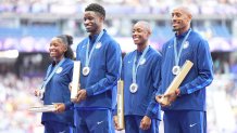 05 August 2024, France, Saint-Denis: Olympics, Paris 2024, Athletics, Stade de France, 4 x 400 m, Mixed, Final, Vernon Norwood (r-l), Shamier Little, Bryce Deadmon and Kaylyn Brown celebrate with their silver medals. Photo: Michael Kappeler/dpa (Photo by Michael Kappeler/picture alliance via Getty Images)