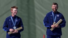 CHATEAUROUX, FRANCE - AUGUST 03: Gold medalist Vincent Hancock of Team United States (R) and silver medalist Conner Lynn Prince of Team United States (L) celebrate on the podium at the Shooting Skeet Men’s medal ceremony on day eight of the Olympic Games Paris 2024 at Chateauroux Shooting Centre on August 03, 2024 in Chateauroux, France. (Photo by Charles McQuillan/Getty Images)