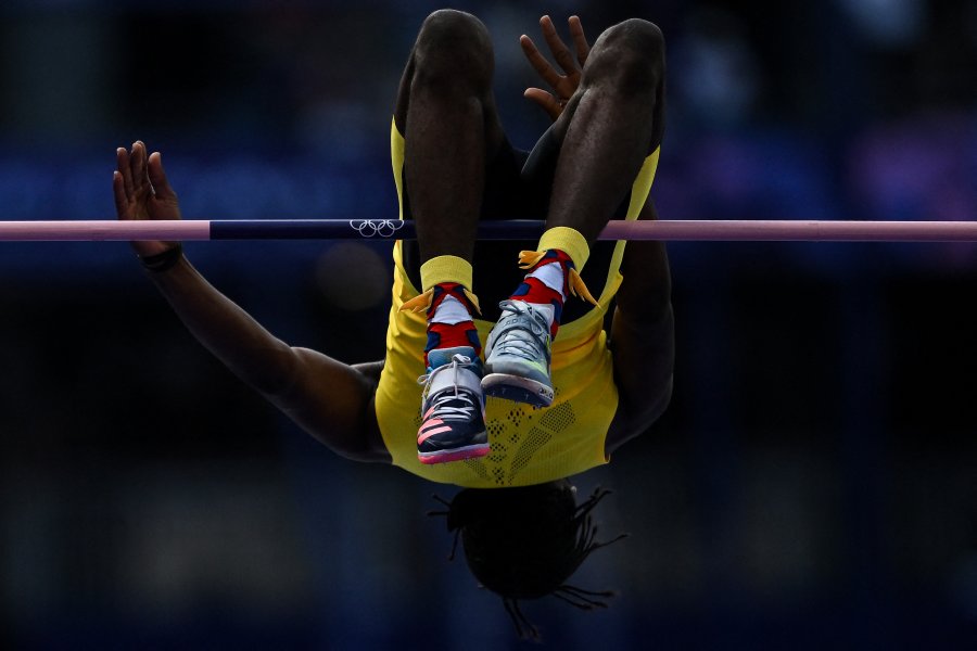 The socks with wings worn by Jamaica's Romaine Beckford are pictured as he competes in the men's high jump qualification of the athletics event at the Paris 2024 Olympic Games at Stade de France in Saint-Denis, north of Paris, on August 7, 2024