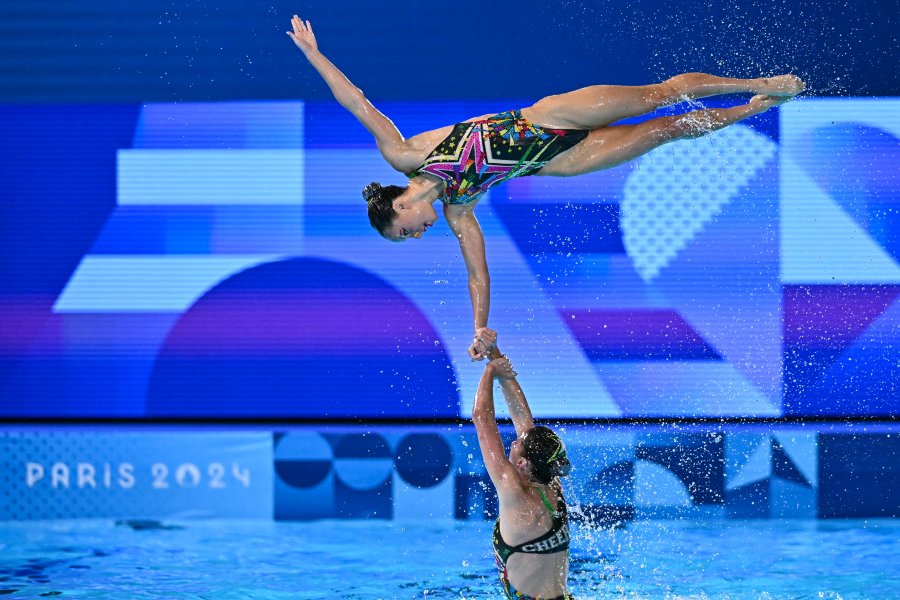 Team Australia compete in the team acrobatic routine of the artistic swimming event