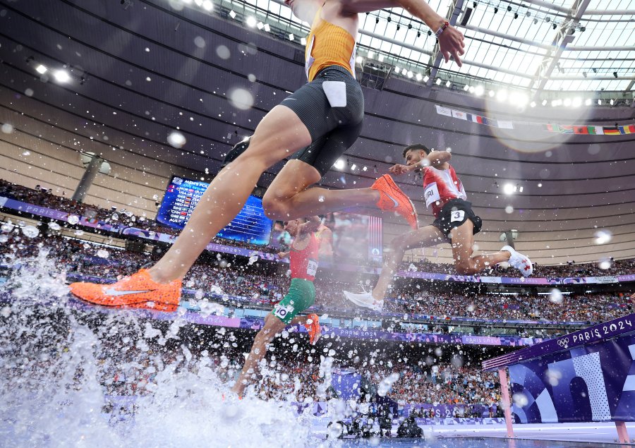 Ahmed Jaziri of Team Tunisia clears the barrier during the Men's 3000m Steeplechase Round 1 on day ten of the Olympic Games Paris 2024 at Stade de France on August 05, 2024 in Paris, France