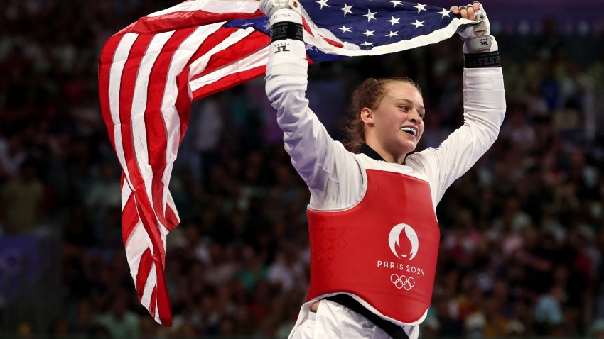 Kristina Teachout holds American flag