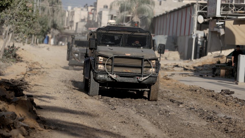 TULKARM, WEST BANK – AUGUST 28: Israeli forces patrol with military vehicle on street after organizing a raid with bulldozers on Nur Shams Refugee Camp in Tulkarm, West Bank on August 28, 2024. It was reported that many infrastructure and buildings were damaged during the raid.