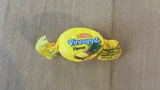 In this photo provided by the NZ Drug Foundation, a pineapple flavored candy filled with a potentially lethal dose of methamphetamine is displayed in Auckland, New Zealand, Tuesday, Aug. 13, 2024.