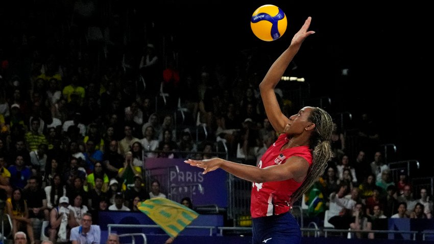 United States middle blocker Chiaka Ogbogu (24) serves the ball against Brazil in a women’s volleyball semifinal match during the Paris 2024 Olympic Summer Games at South Paris Arena 1. Mandatory Credit: Michael Madrid-USA TODAY Sports