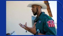 Slain Dallas police officer Darron Burks, volunteering with the Boy Scouts.