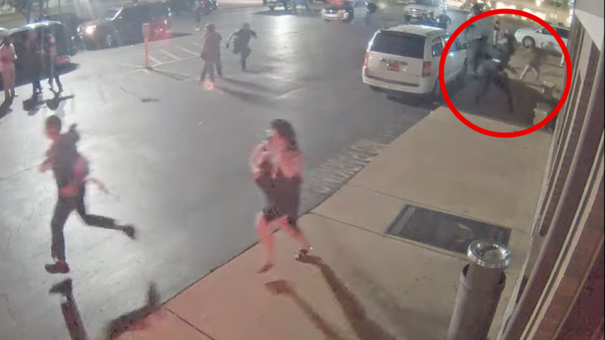 A still from surveillance video shows a protester charging towards Officer Travis Brown, in Ferguson, Mo.