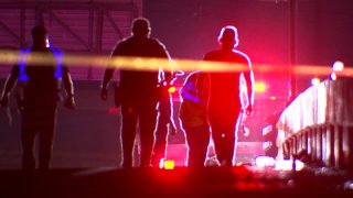 First responders at the site of a crash that killed five people in Fort Worth, Aug. 19, 2024.