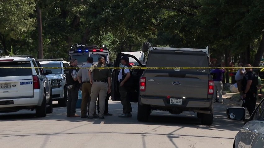 Police and sheriff’s deputies respond to a shooting and barricaded man after a deputy was shot serving a felony warrant Wednesday, Aug. 7, 2024.