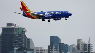 A Southwest Airlines Boeing 737-7H4 approaches San Diego International Airport for a landing from Houston on June 28, 2024 in San Diego, California. 