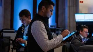 Traders work on the New York Stock Exchange floor on Sept. 9, 2024.