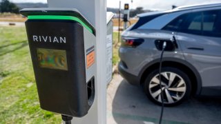 A Volkswagen ID.4 electric vehicle (EV) at a Rivian charging station in San Francisco, California, US, on Tuesday, June 25, 2024. 