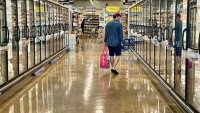 A customer shops at a Whole Foods grocery store in Edgewater, N.J. on Sept. 11th, 2024.